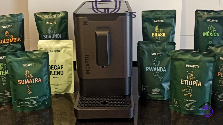 analisis-incapto cafetera Incapto negra rodeada de sus distintas variedades de café