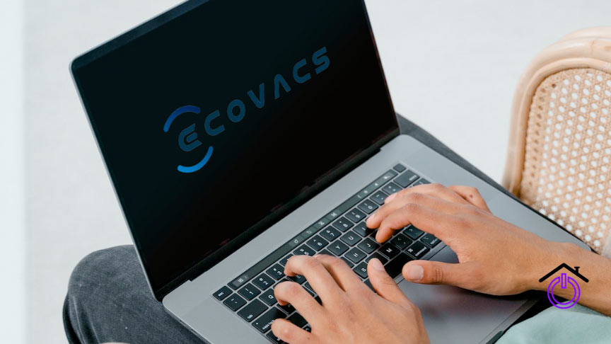 robot-aspirador-ecovacs-opiniones ordenador portatil interactuando con el logotipo de los robot aspirador Ecovacs