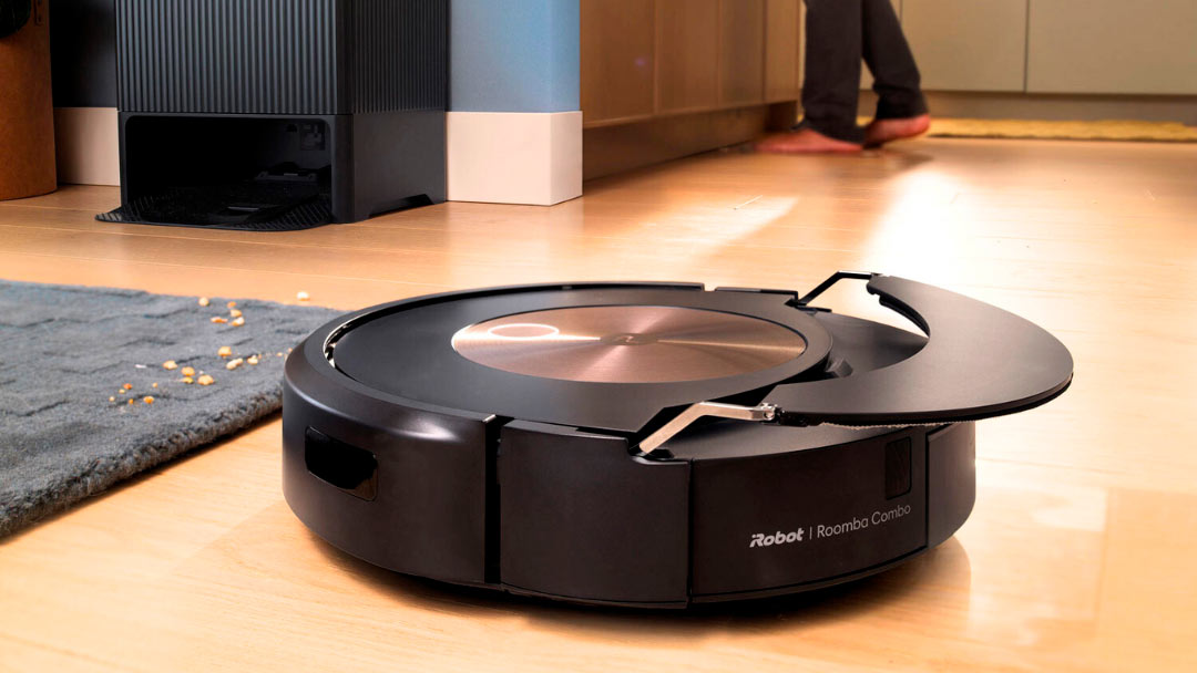 robot-aspirador-roomba uno de los mejores robot aspirador Roomba en el suelo del salón