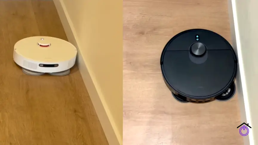 robots aspirador blanco y negro fregando